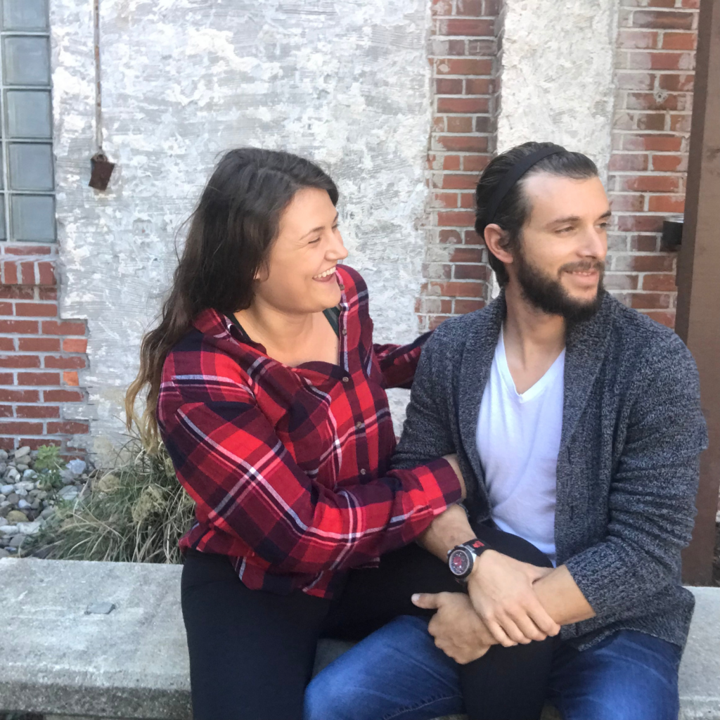 couple posing and laughing